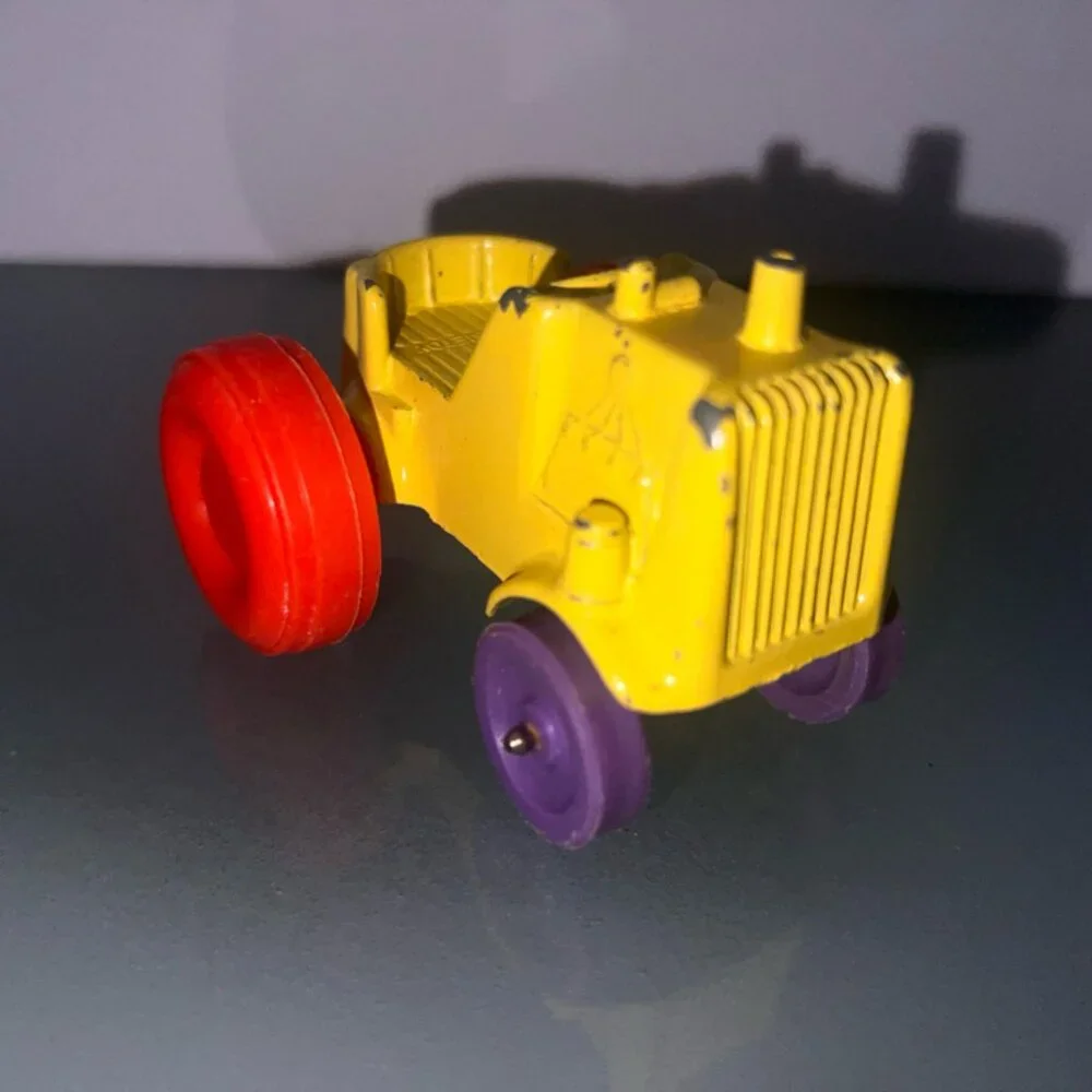 Vintage 1967 Tootsietoy Diecast Yellow Tractor with Orange‎ & Purple Tires (No)